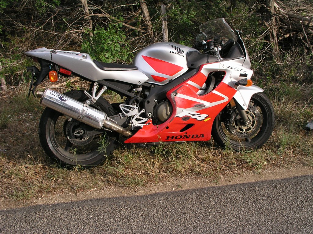 Honda motorcycle hits car